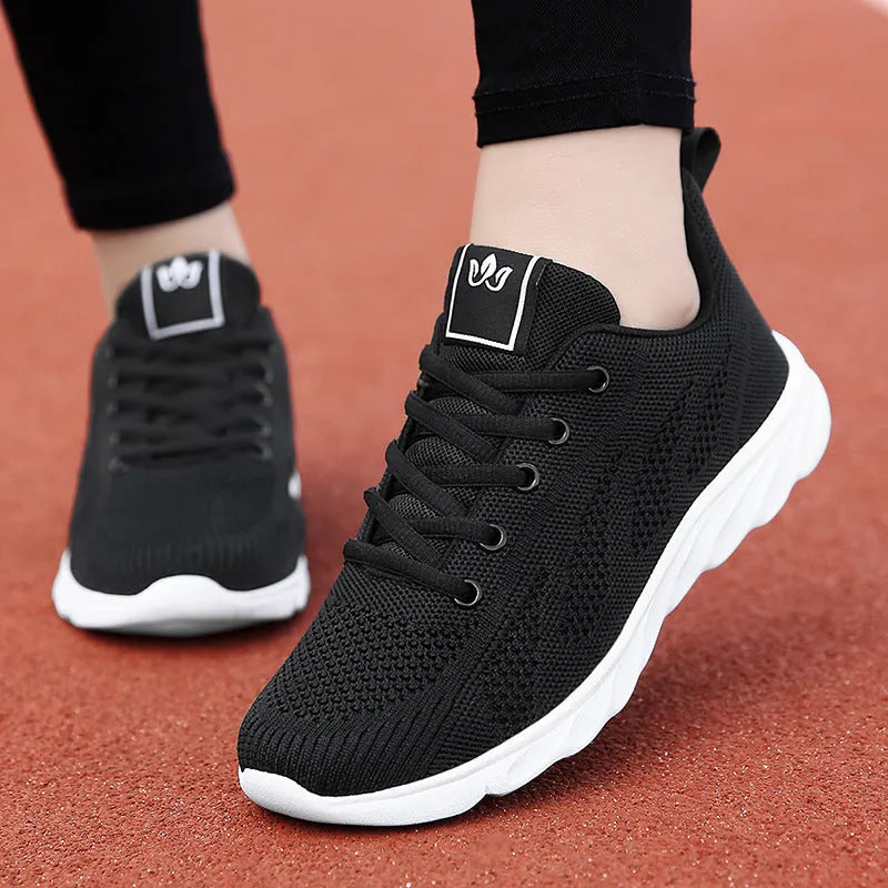 Women's high-top casual trainers with back lacing and sticky rubber outsole in black, pink, or white colours.