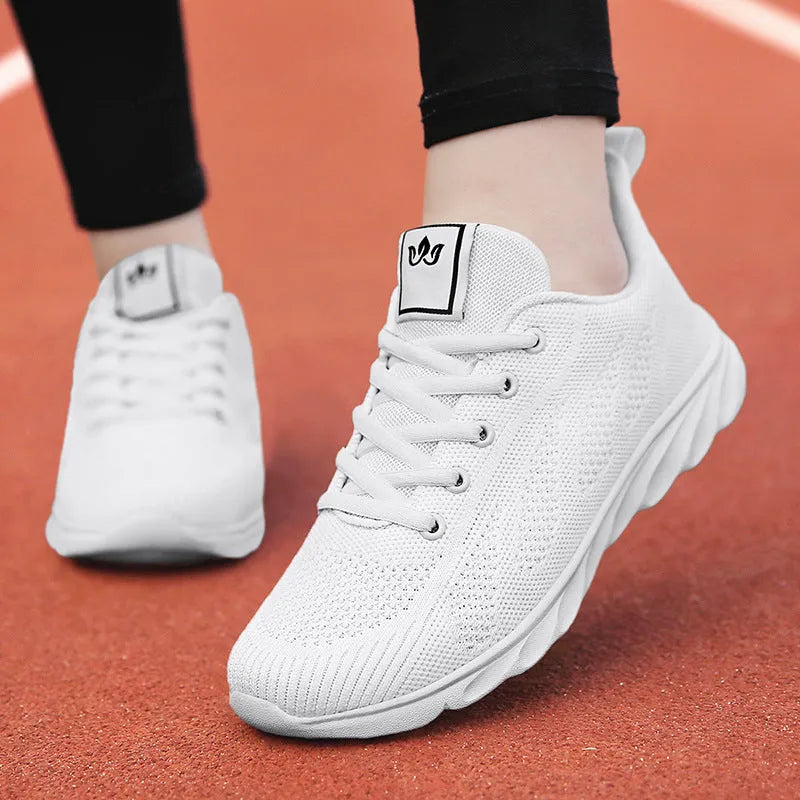 Women's high-top casual trainers with back lacing and sticky rubber outsole in black, pink, or white colours.