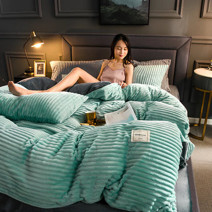 Double-thick velvet bed sheets in Romantic Powder colour showing 400gsm texture and printed pattern detail