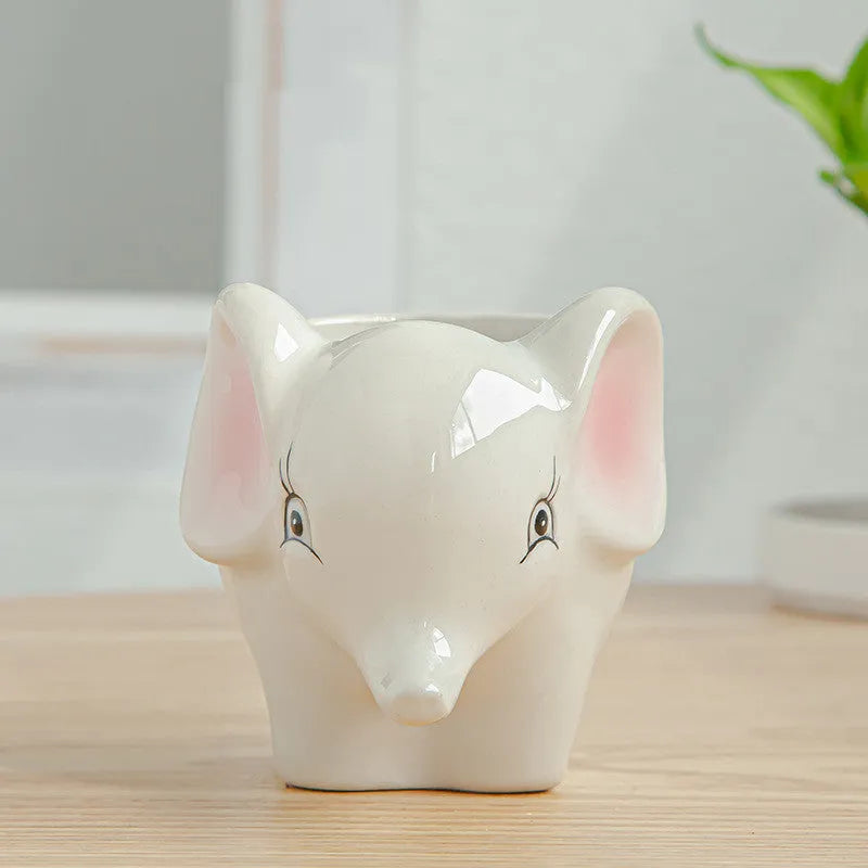 Simple cartoon animal ceramic flower pot for succulents and small plants, Nordic style, breathable and corrosion-resistant.