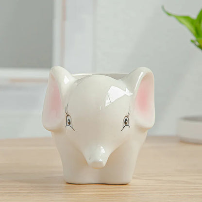 Simple cartoon animal ceramic flower pot for succulents and small plants, Nordic style, breathable and corrosion-resistant.