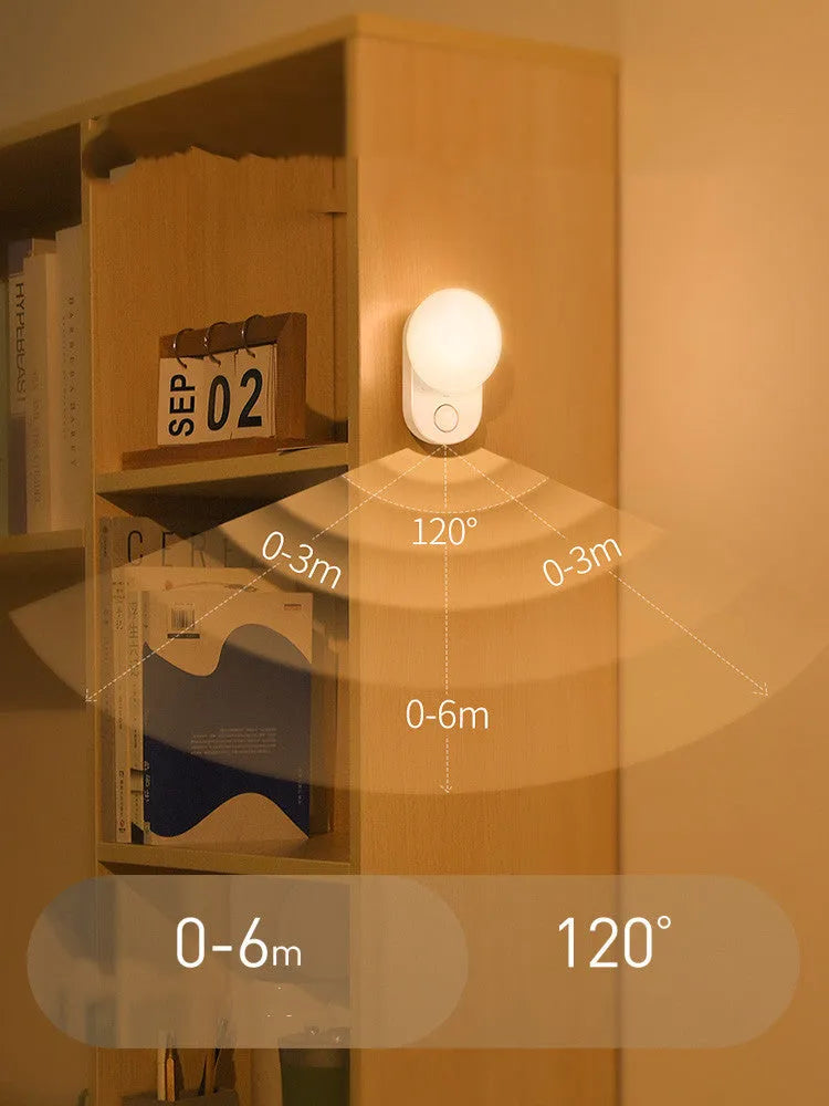 Baseus white sensor night light with circular design showing LED illumination and motion detection sensor