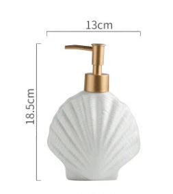 Ceramic soap dispenser with embossed starfish or shell design for elegant bathroom decor