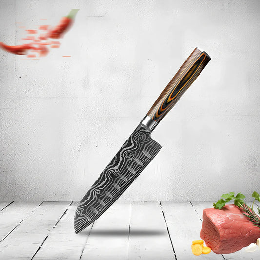 Laser pattern knife set with stainless steel chef, slicing, and fruit knives on a cutting board