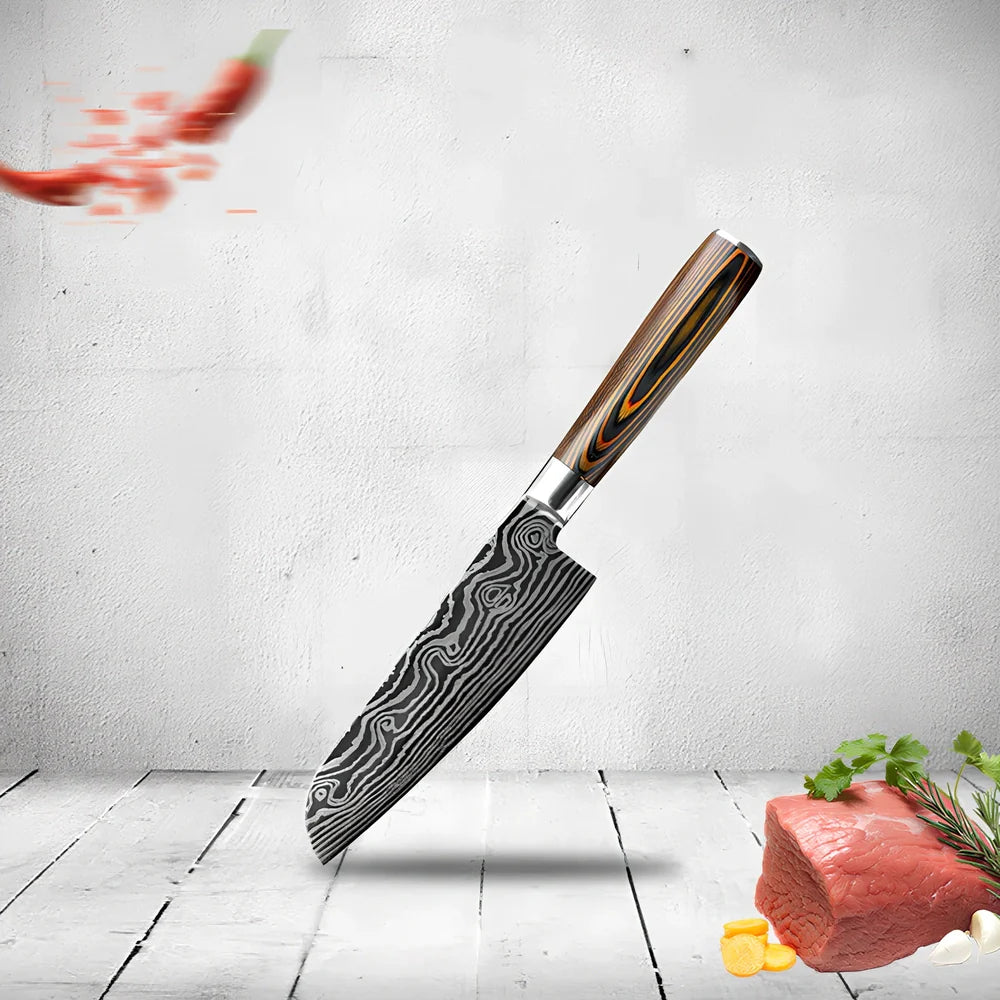 Laser pattern knife set with stainless steel chef, slicing, and fruit knives on a cutting board