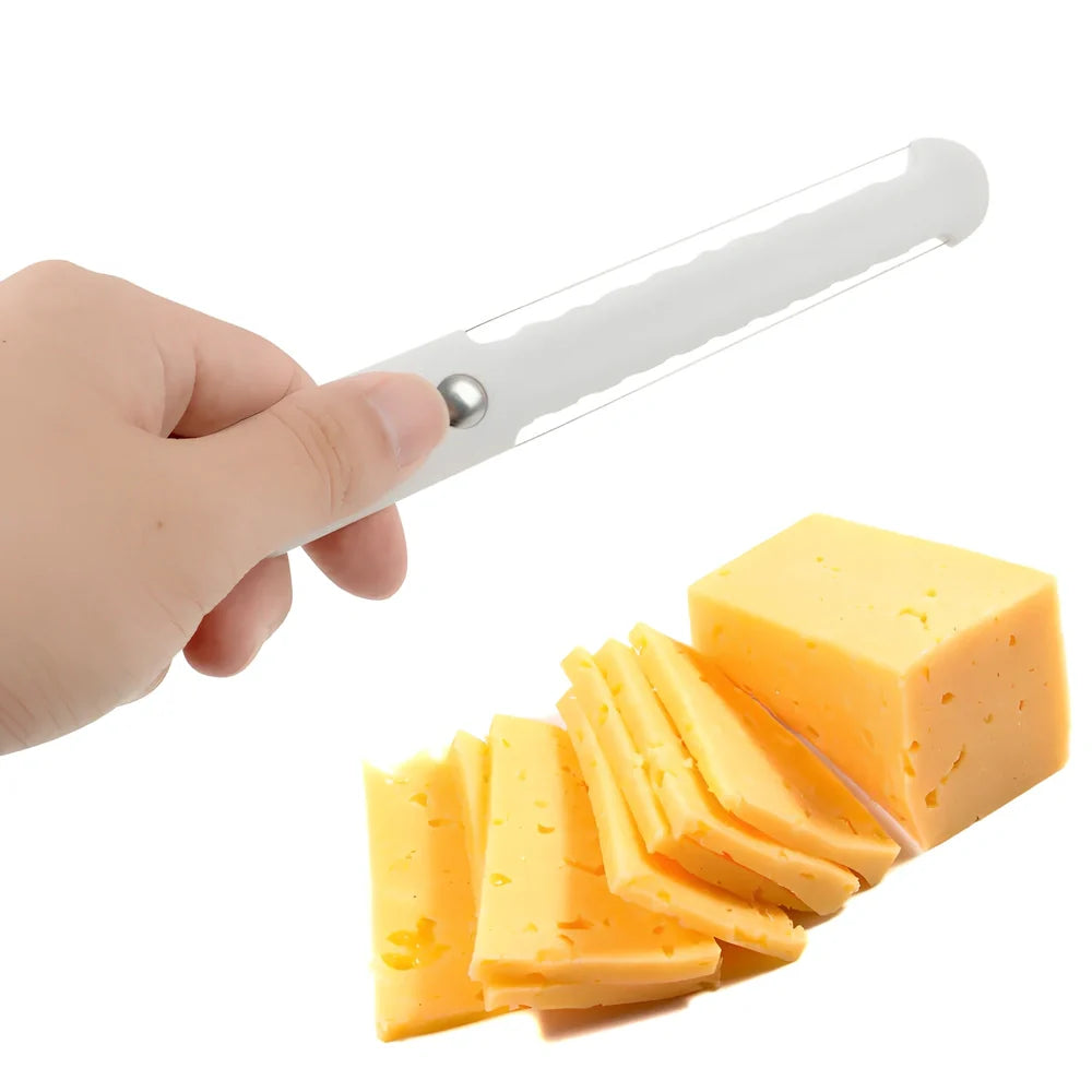 White plastic butter knife measuring 22.6cm long with modern simple design for food preparation