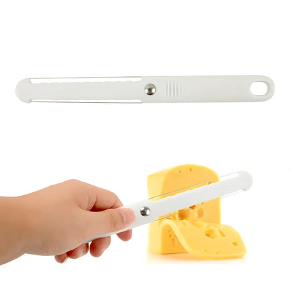 White plastic butter knife measuring 22.6cm long with modern simple design for food preparation