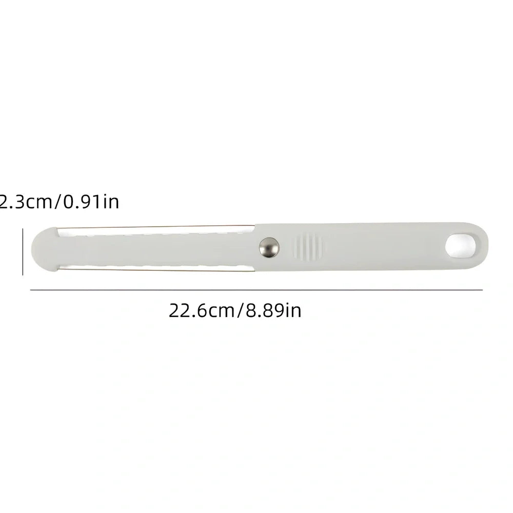 White plastic butter knife measuring 22.6cm long with modern simple design for food preparation