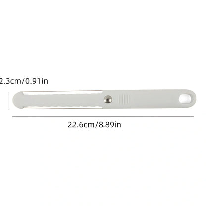 White plastic butter knife measuring 22.6cm long with modern simple design for food preparation