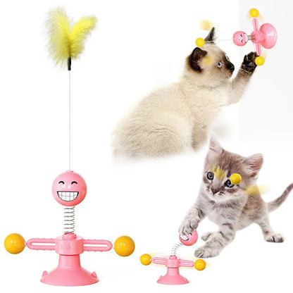 Cat rotating windmill toy with suction base, two transparent bins, blue and yellow-green TPR body.