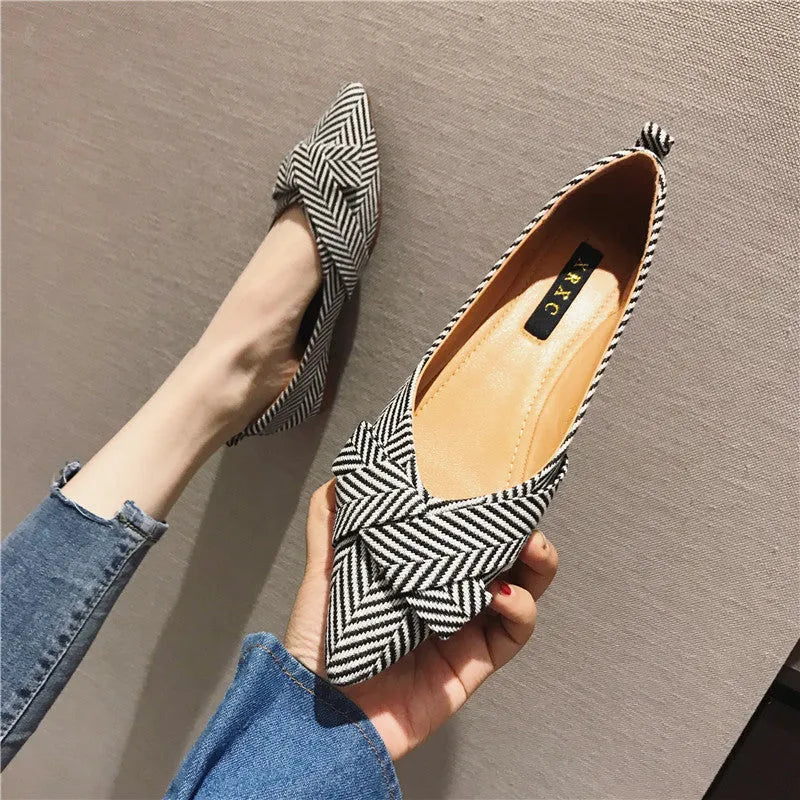 Women's black and red pointed toe flats with low 1-3cm heel, cotton upper, and super fibre lining