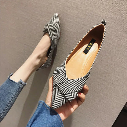 Women's black and red pointed toe flats with low 1-3cm heel, cotton upper, and super fibre lining