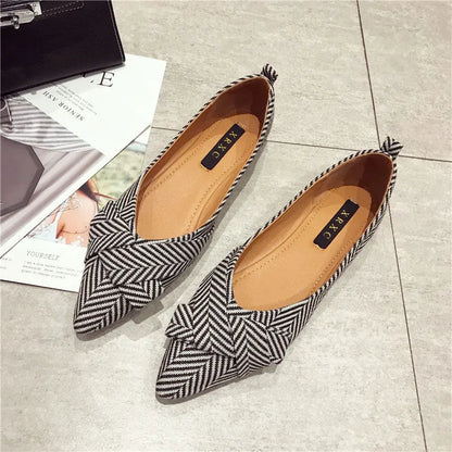 Women's black and red pointed toe flats with low 1-3cm heel, cotton upper, and super fibre lining