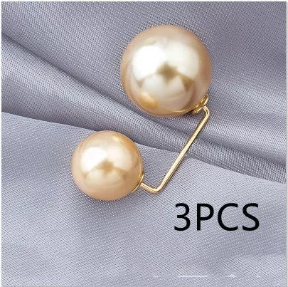 Copper bow tie brooch with pearl detail for skirt waist