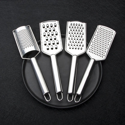 Stainless steel kitchen grater set with four grating options for cheese, vegetables, and ginger