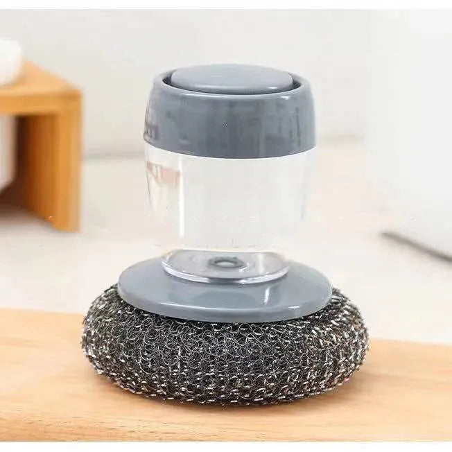 Black and gold kitchen palm brush with soap dispenser for scrubbing stoves and tiles