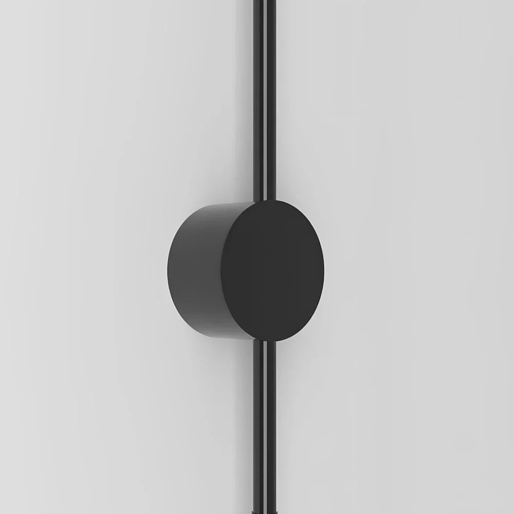 Black 60cm linear LED bathroom mirror lamp with acrylic shade mounted above bathroom mirror