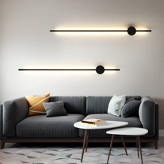 Black 60cm linear LED bathroom mirror lamp with acrylic shade mounted above bathroom mirror