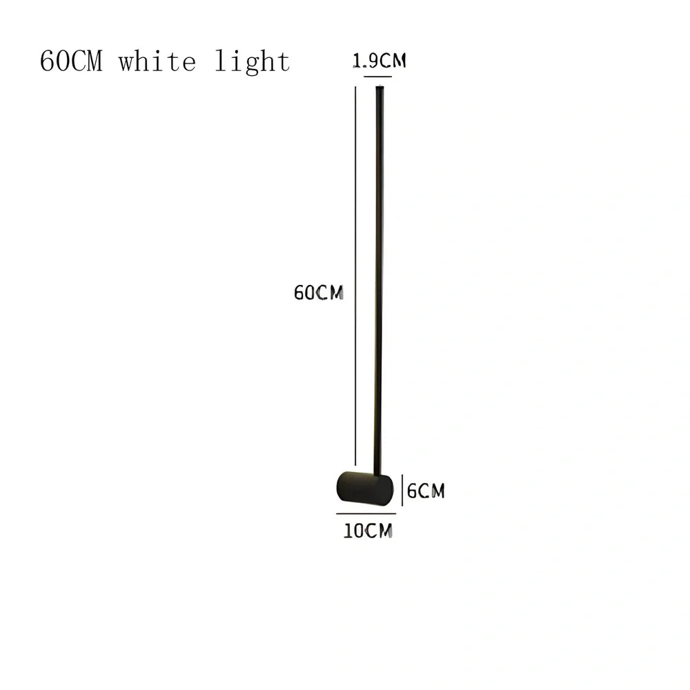 Black 60cm linear LED bathroom mirror lamp with acrylic shade mounted above bathroom mirror