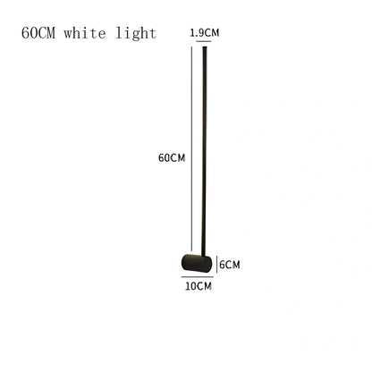 Black 60cm linear LED bathroom mirror lamp with acrylic shade mounted above bathroom mirror