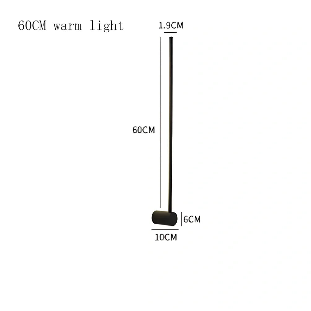 Black 60cm linear LED bathroom mirror lamp with acrylic shade mounted above bathroom mirror