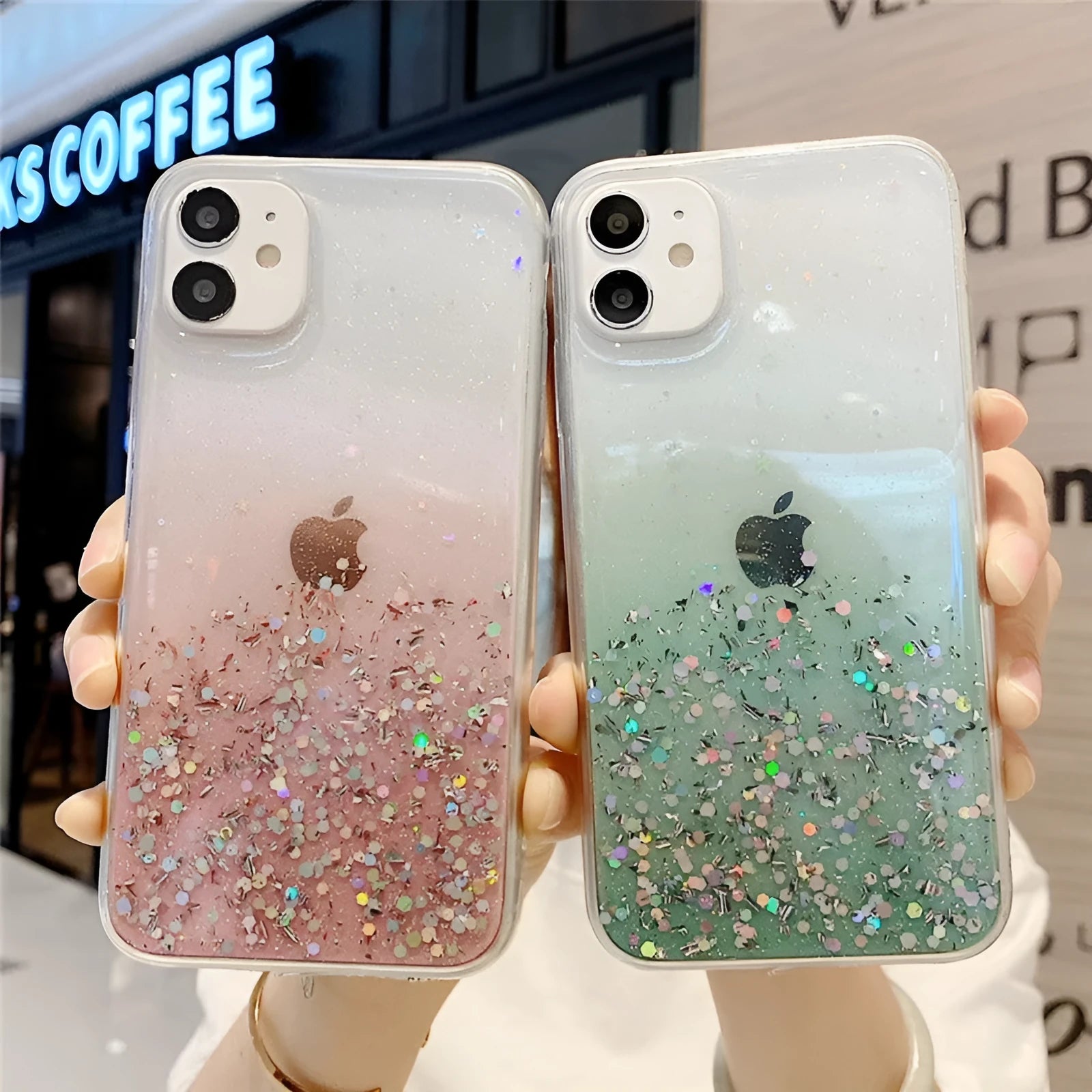 Transparent glitter epoxy soft shell case for Apple iPhone on a table.