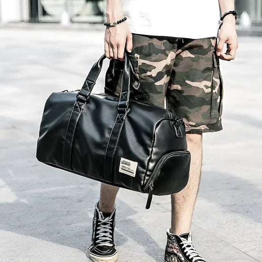 Black PU leather sports training bag with zipper pockets, showing 56-75 litre capacity and handle accessory
