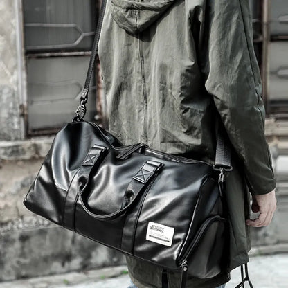Black PU leather sports training bag with zipper pockets, showing 56-75 litre capacity and handle accessory