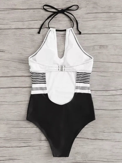 Black one-piece striped swimsuit for women, made from durable nylon
