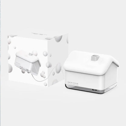 White igloo-shaped ultrasonic humidifier and essential oil diffuser with LED light on a wooden table.