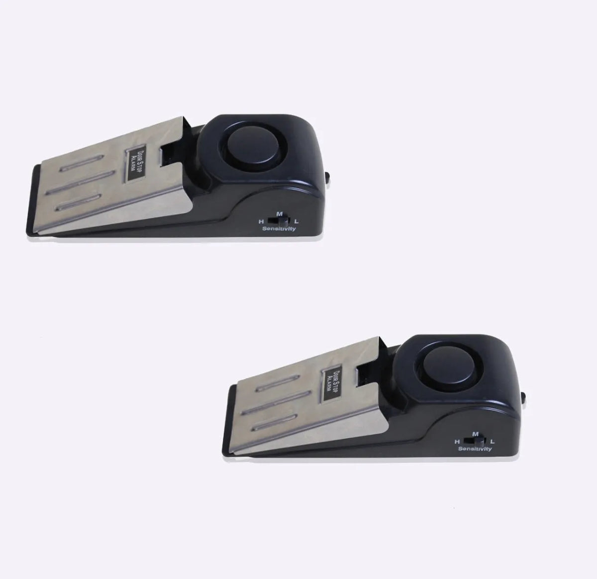Portable wedge-shaped door stop alarm unit with stainless steel cover and sensitivity controls.
