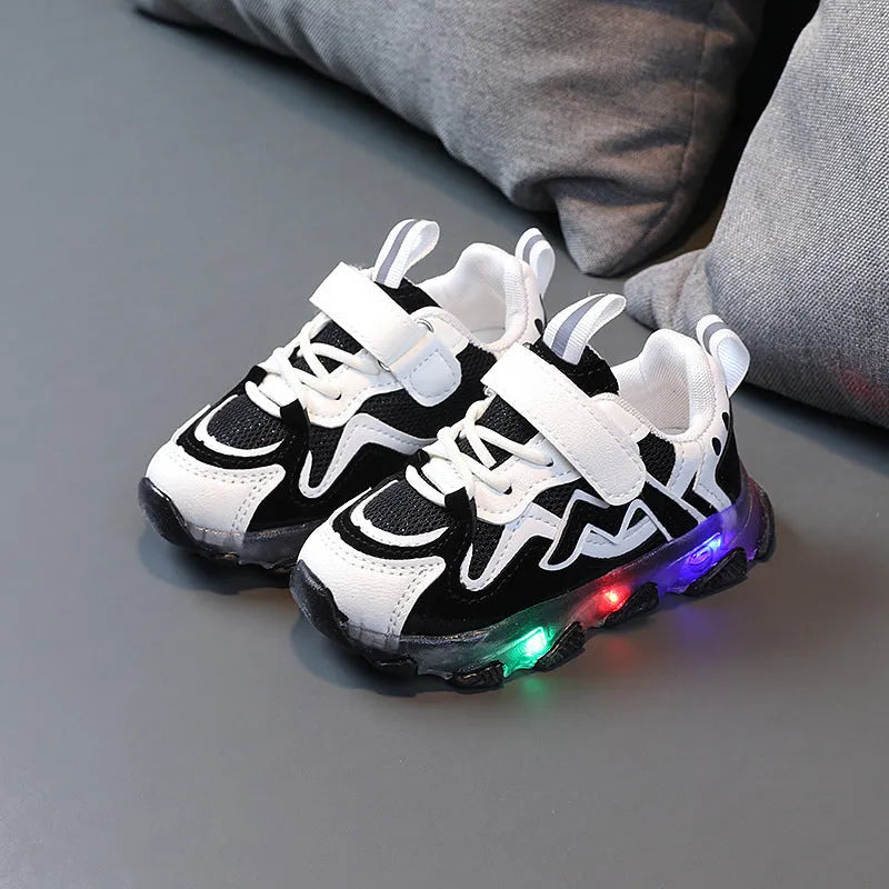 Kids black mesh Velcro sneakers with rubber sole for toddlers, showing adjustable strap and breathable design
