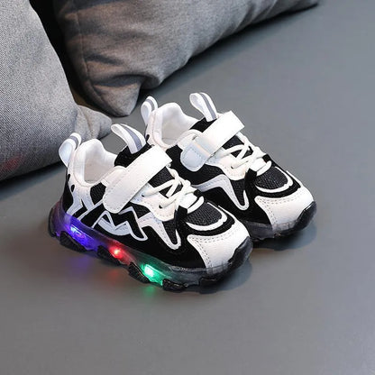 Kids black mesh Velcro sneakers with rubber sole for toddlers, showing adjustable strap and breathable design
