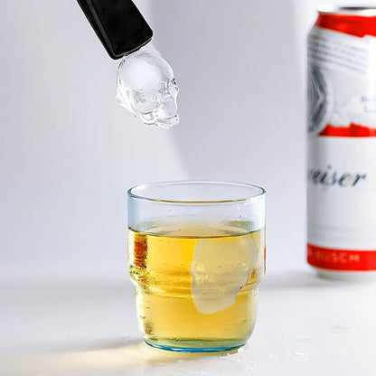Silicone skull ice tray with detailed 3D cavities creating Halloween-themed ice sculptures