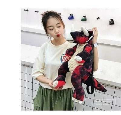 3D dinosaur plush backpack for kids in blue, red, brown, and green