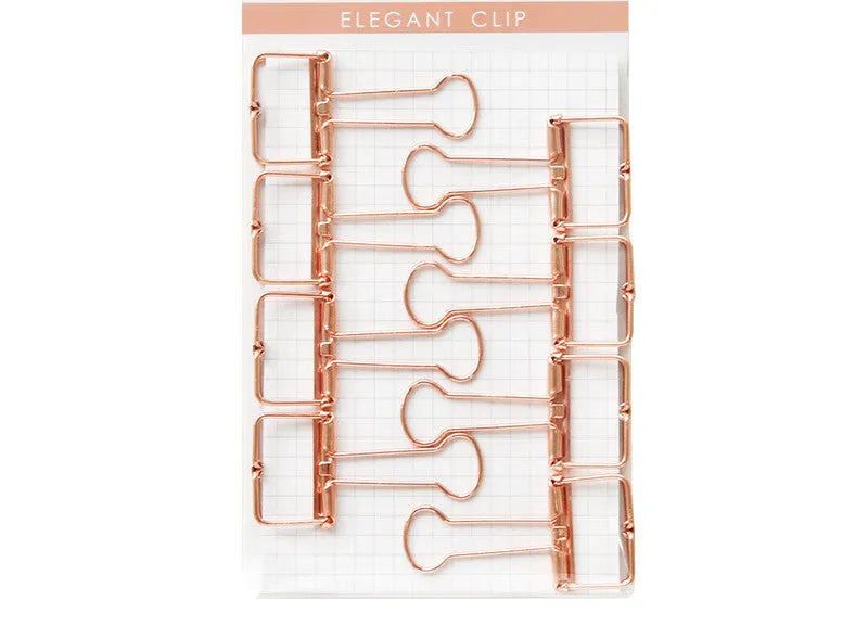 Rose gold metal binder set showing small and large sizes for ticket and paper organisation