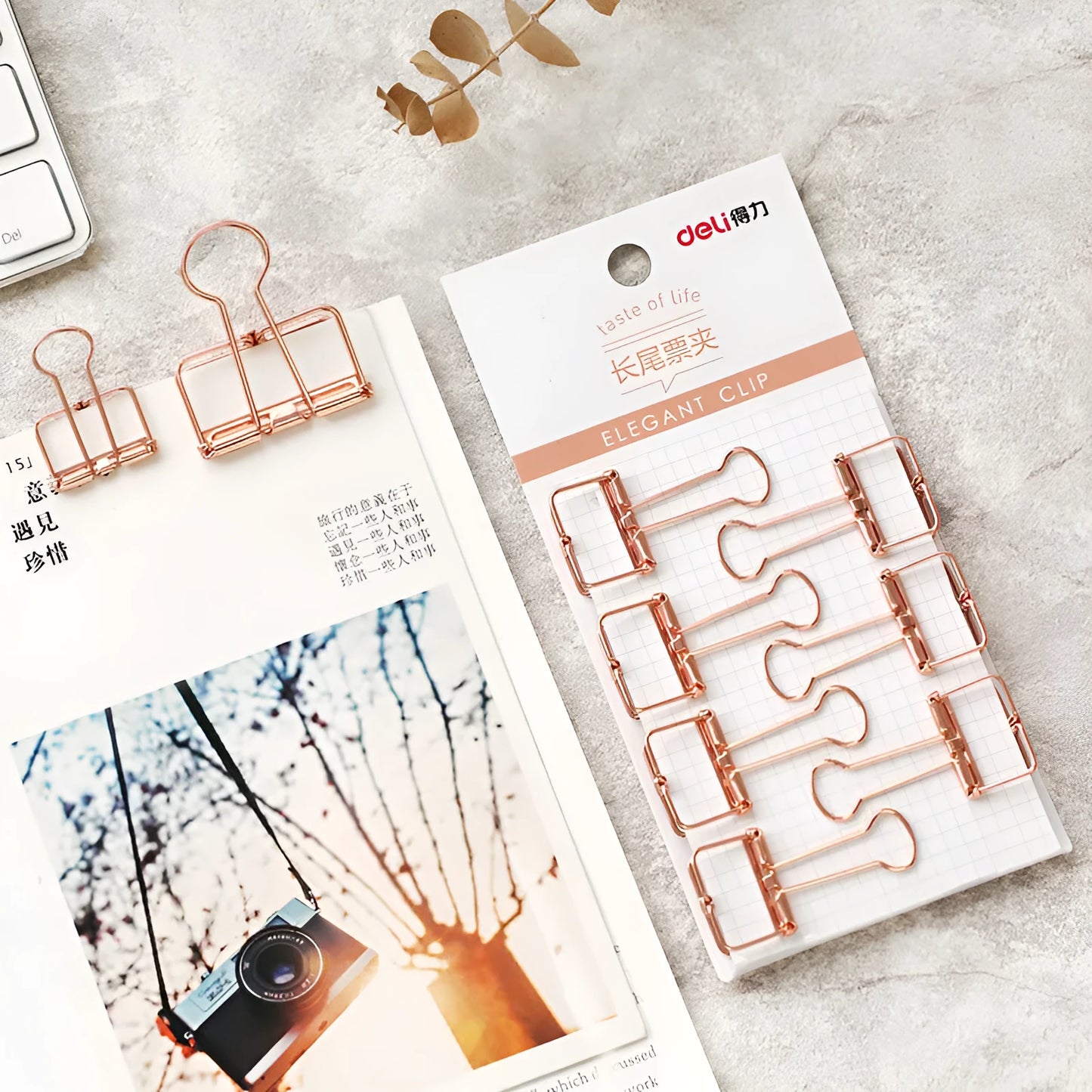 Rose gold metal binder set showing small and large sizes for ticket and paper organisation