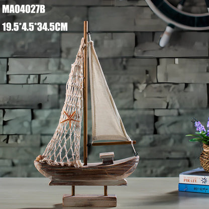 Hand-carved pine fishing boat model with Mediterranean painted patterns and relief details