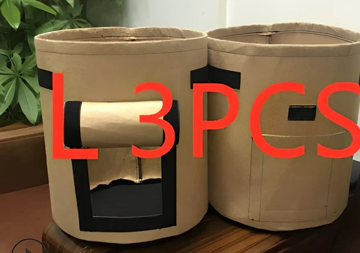 Black plant growth bag with side harvesting window and double handles for potato gardening