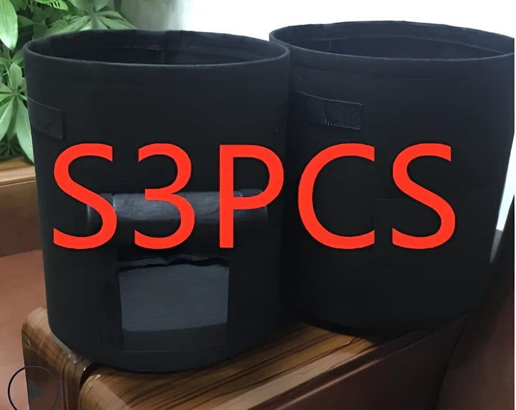 Black plant growth bag with side harvesting window and double handles for potato gardening