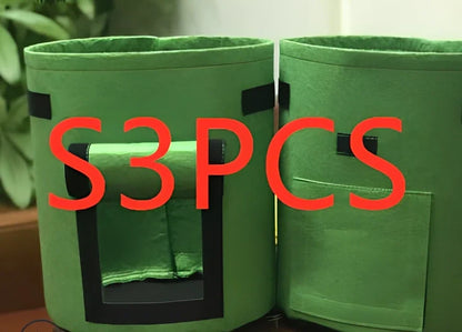 Black plant growth bag with side harvesting window and double handles for potato gardening