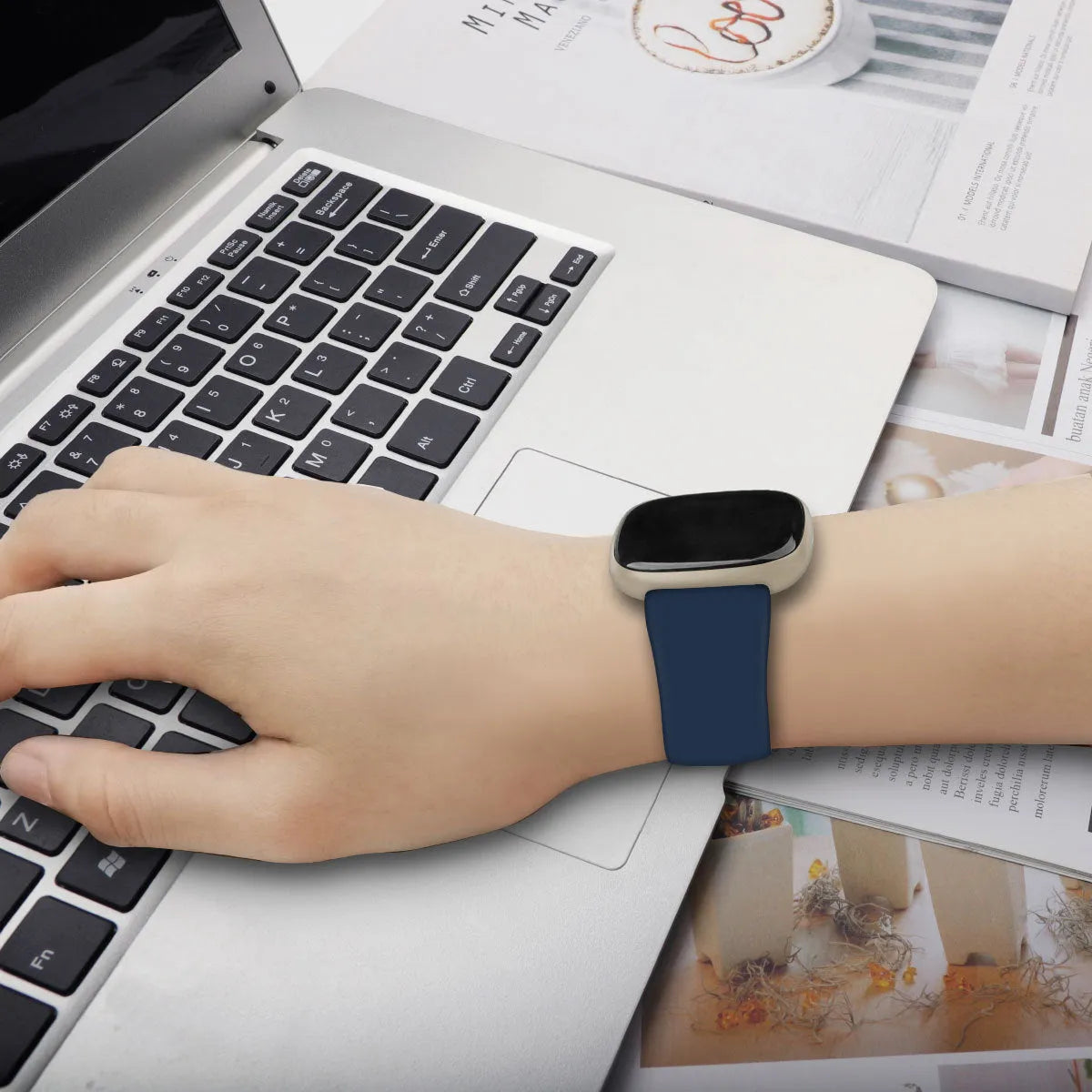 Fitbit Versa 3 smartwatch strap in TPU silicone showing colour options.
