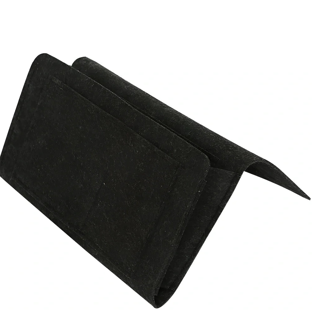 Felt bedside storage bag measuring 30x20x10cm with multiple pockets for remote controls and books