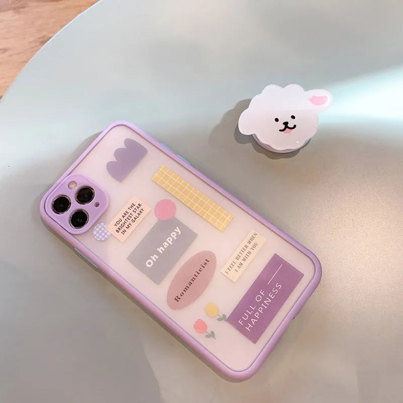 Frosted TPU mobile phone case with integrated stand bracket for Apple iPhone, showing cartoon design options.
