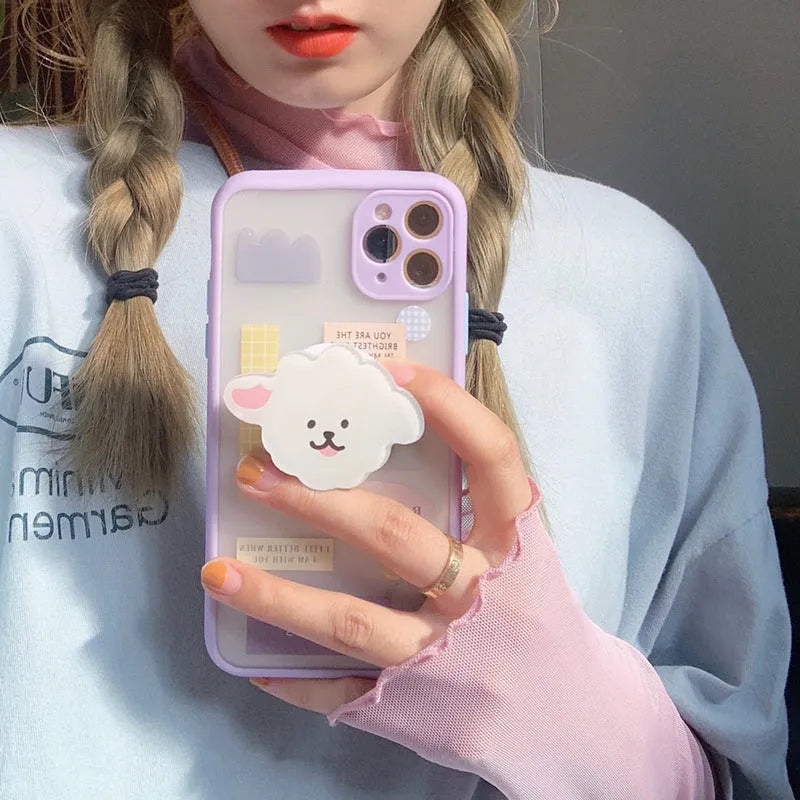 Frosted TPU mobile phone case with integrated stand bracket for Apple iPhone, showing cartoon design options.