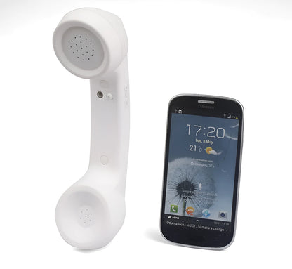 Retro-style Bluetooth wireless headset in hand, showing classic phone handset design and ear hook.