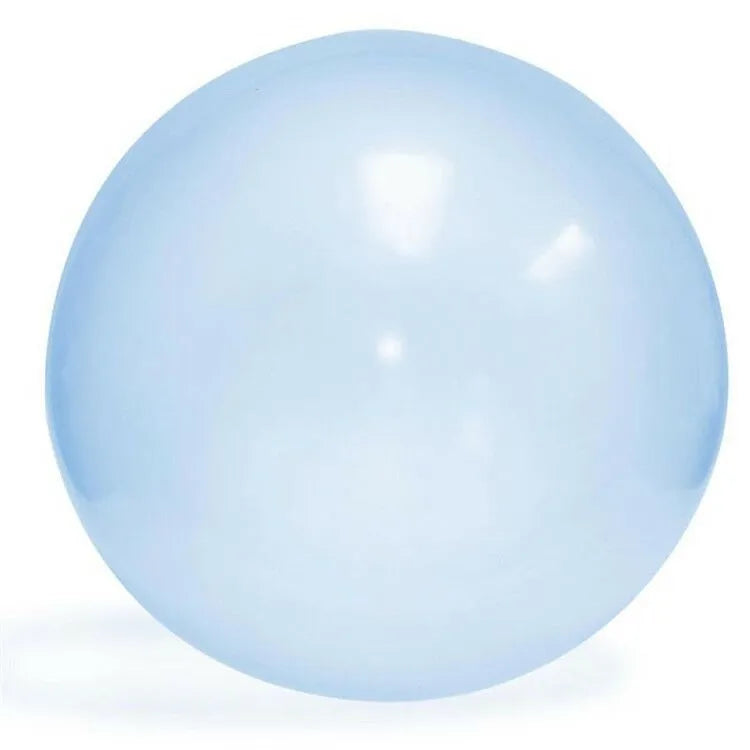 Large pink, yellow, green, and blue inflatable bouncy balls in various sizes for children's play.
