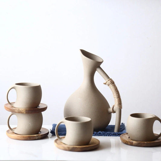 Elegant Ceramic Cold Brew Kettle Set with matching cups on bamboo tray