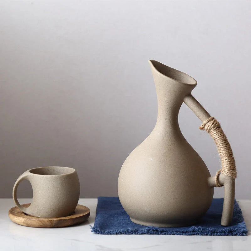 Elegant Ceramic Cold Brew Kettle Set with matching cups on bamboo tray