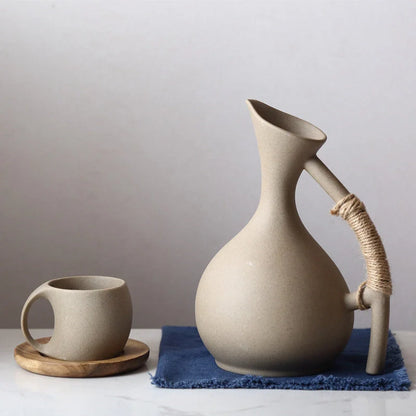 Elegant Ceramic Cold Brew Kettle Set with matching cups on bamboo tray